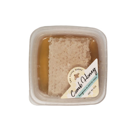 Comb honey in plastic container