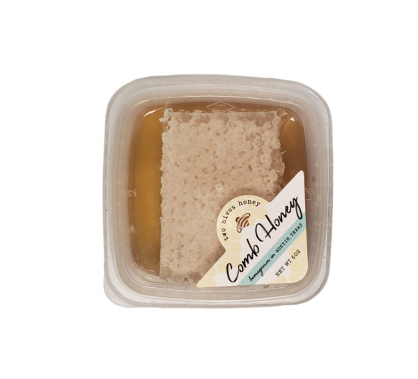 Comb honey in plastic container