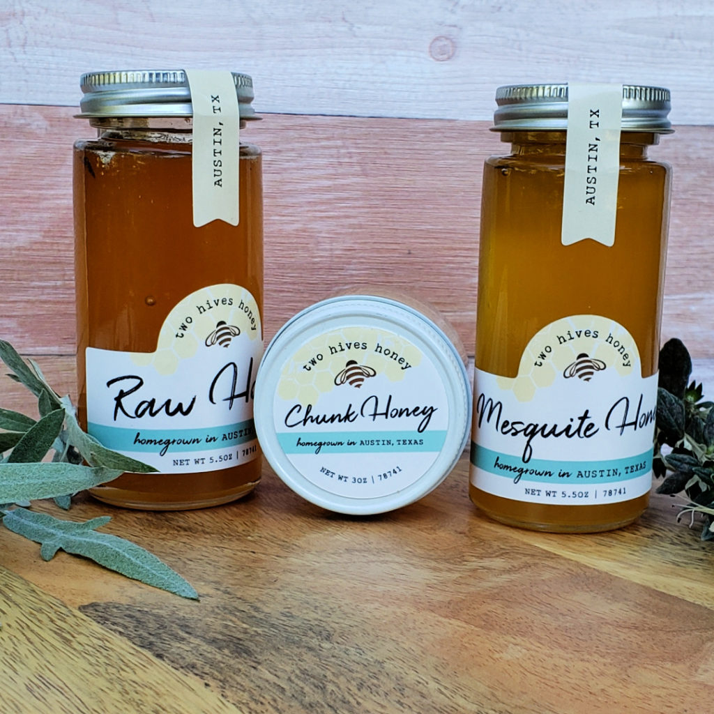 Three jars of different types of honey